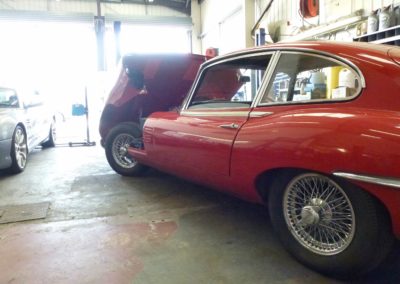 red car inside the workshop | Regent Coaches | Kent